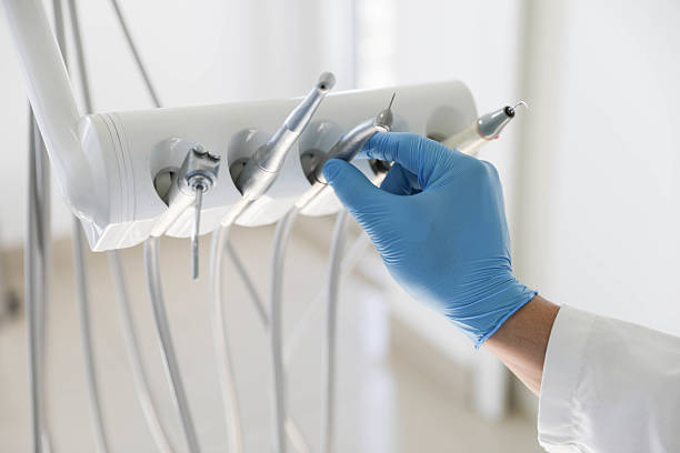 Professional Root Canal Treatment technician working in Florissant, MO